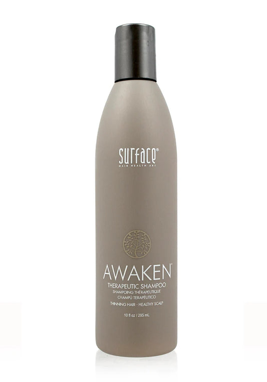 Surface Awaken shampoo bottle on a white background